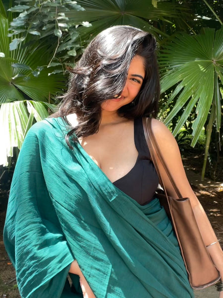 Bottle Green Handwoven Mul Mul Cotton Saree With Tassels